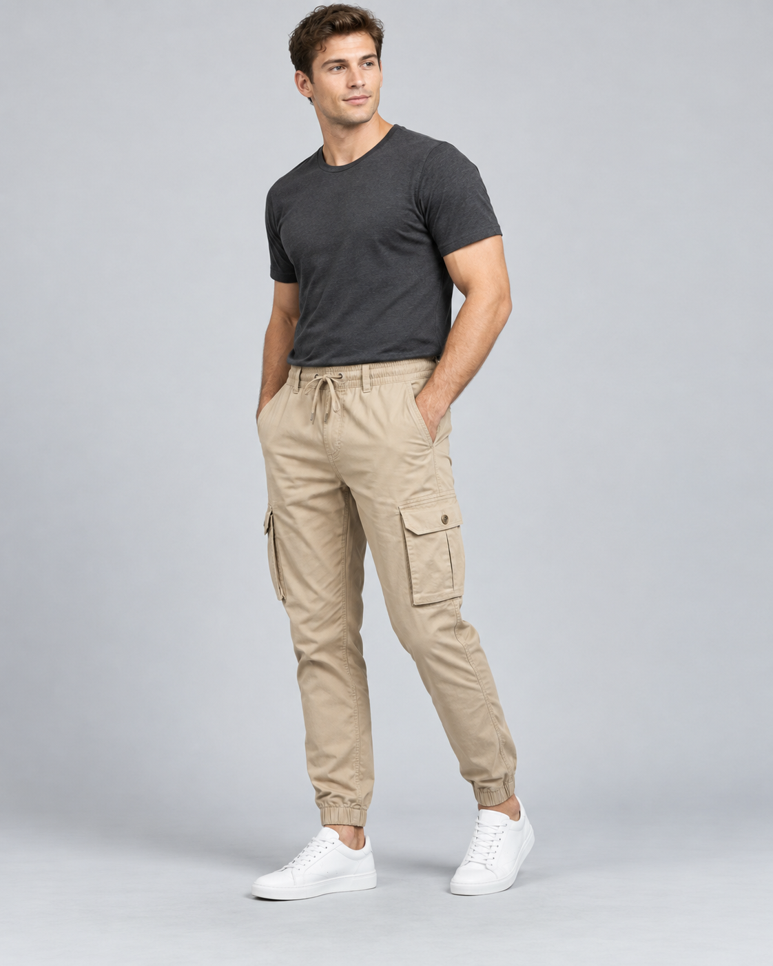 Studio model wearing Jacky & Jamey cargo pants with side-thigh flap pockets