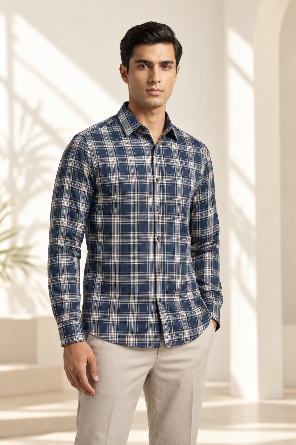 Asian model wearing a navy checked Jacky & Jamey shirt