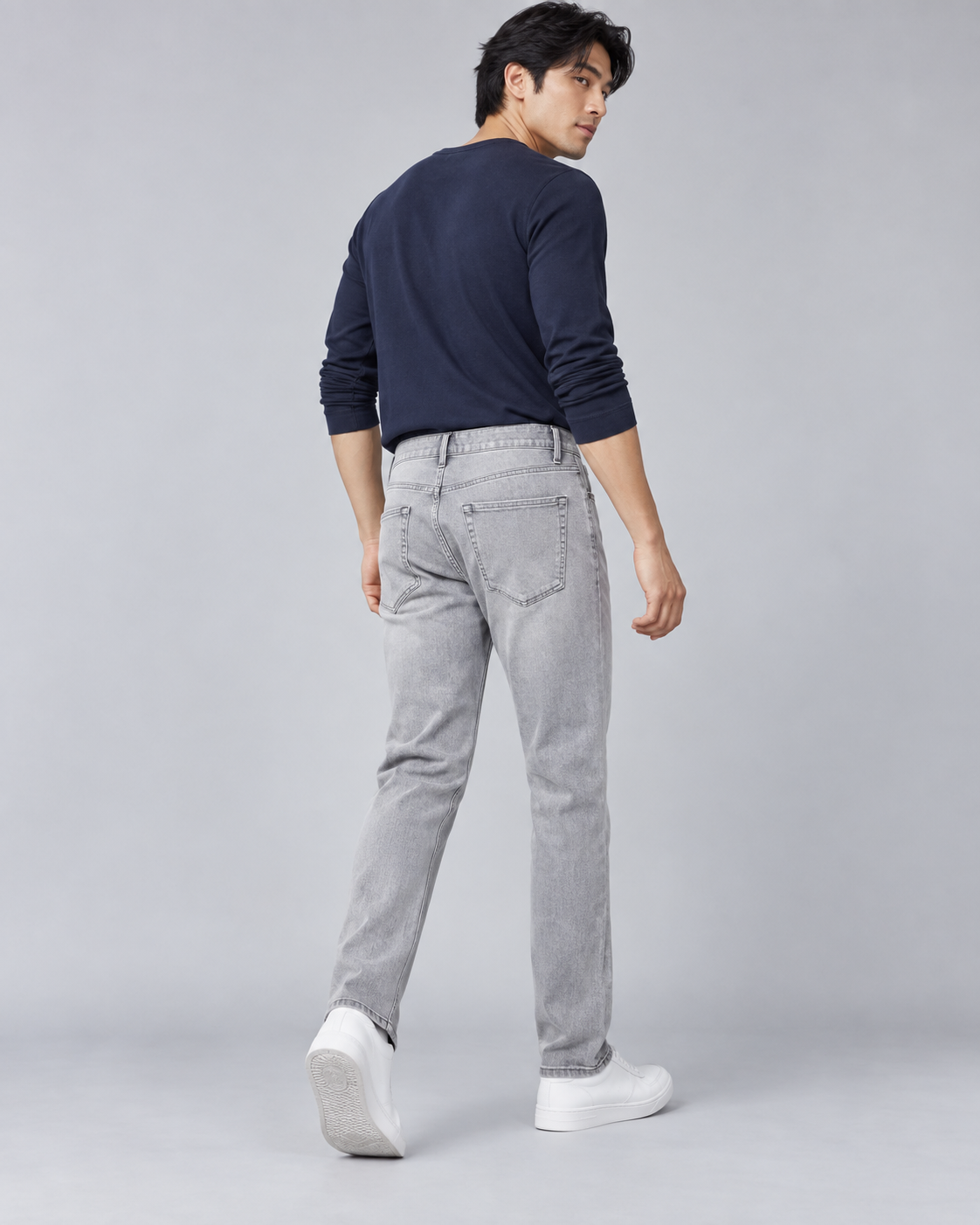 Studio model showing Jacky & Jamey light-grey denim jeans
