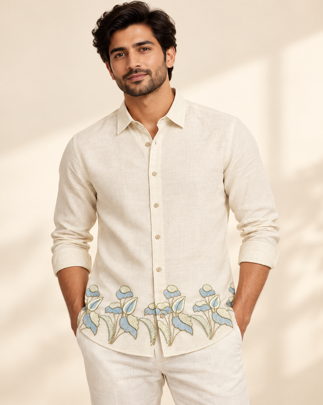Model wearing cream Jacky and Jamey blue floral embroidered shirt