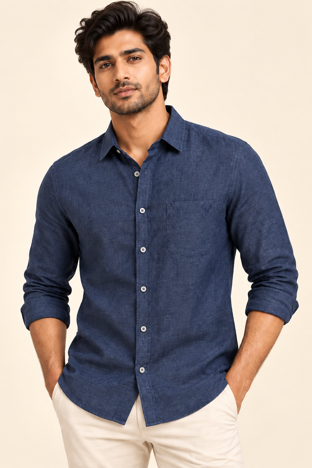 Model wearing a navy Jacky and Jamey linen shirt