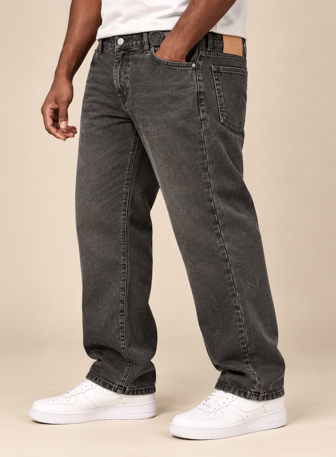 Model wearing charcoal Jacky and Jamey denim pants